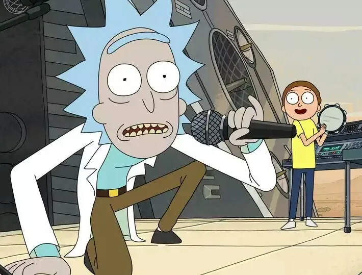 Rick and Morty standing on a stage, Rick singing into a microphone