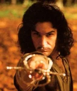 Inigo Montoya, a swordsman with long dark hair, staring intensely