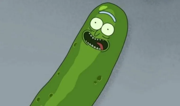 A pickle with Rick Sanchez's face lying on a table