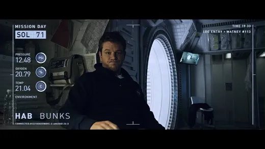 Matt Damon as astronaut Mark Watney speaking into a camera