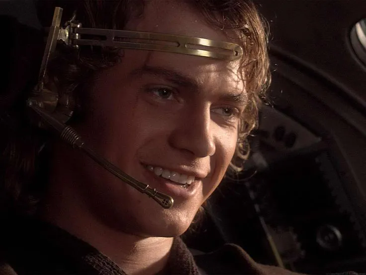Anakin Skywalker in his starfighter cockpit, smiling confidently