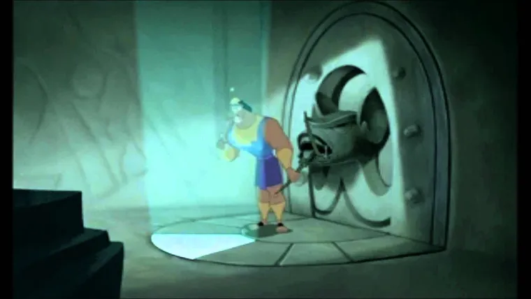 Kronk standing at a lever in a dark laboratory, looking unsure