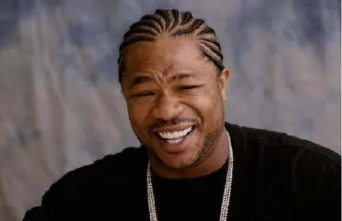 Rapper Xzibit laughing broadly